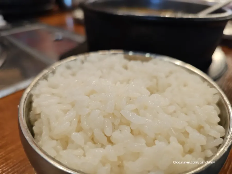 A bowl of sundae gukbap eaten with chives mixed in
