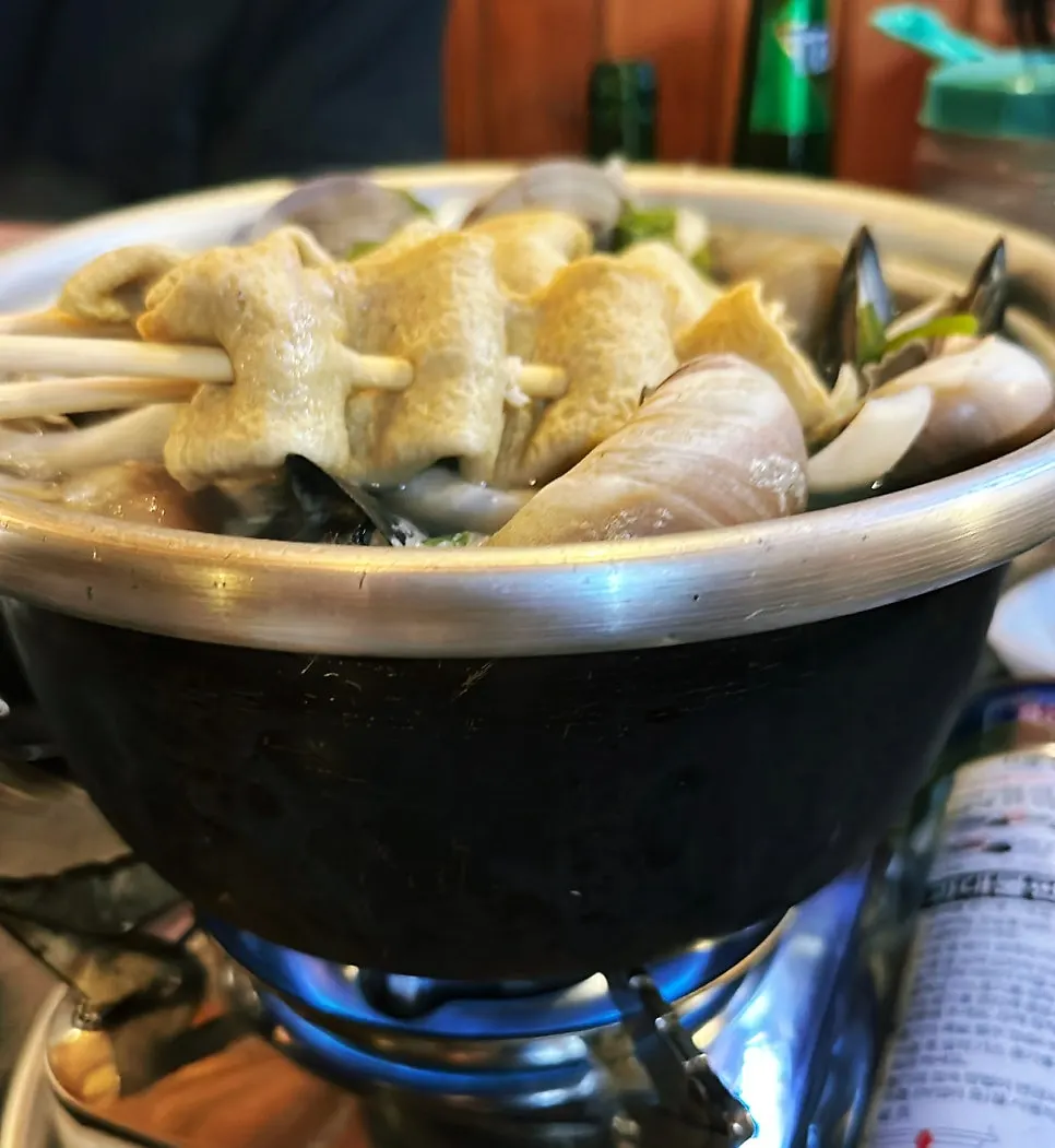 Large whelk pieces lifted from the hotpot