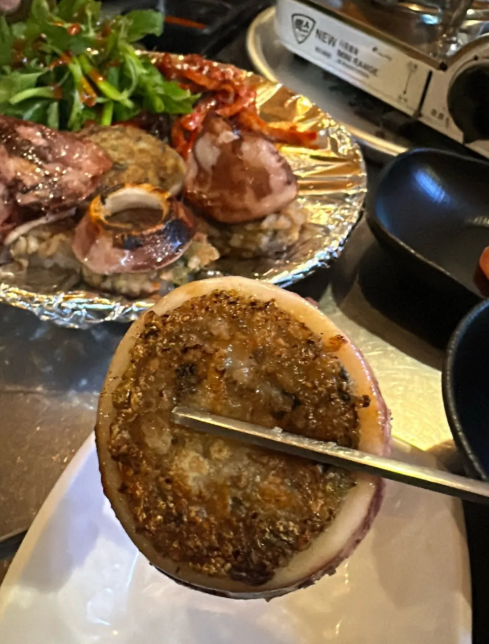 Squid sundae served with dried radish strips