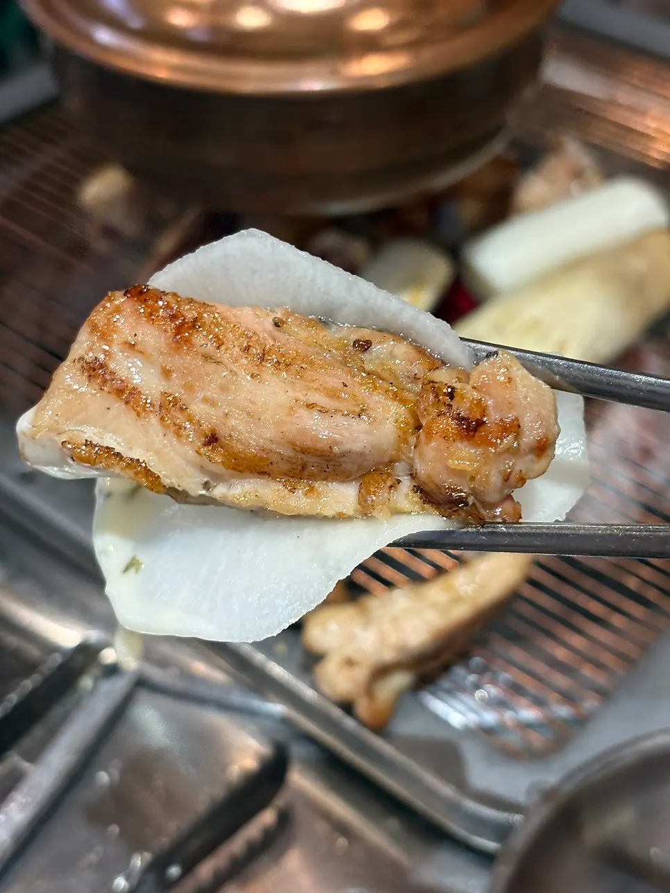 A piece of mildly seasoned garlic salt chicken galbi