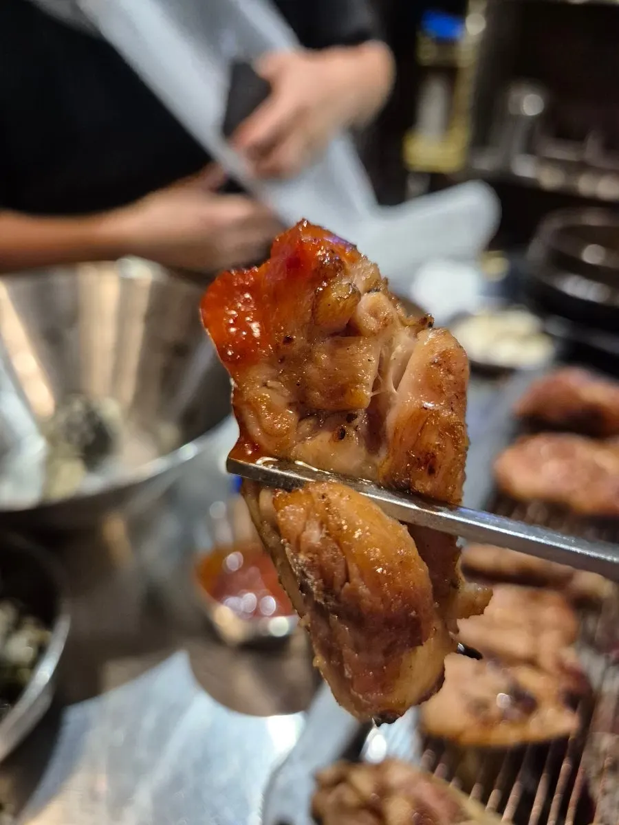 Charcoal chicken galbi dipped in spicy sauce