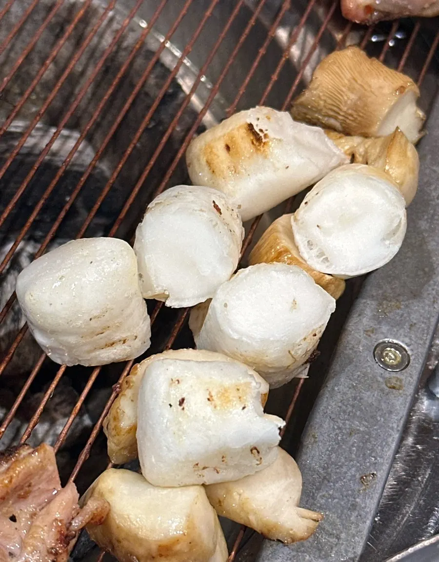 Bite-sized rice cake dipped in honey