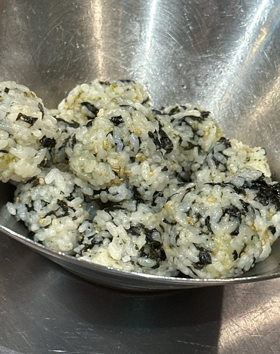 Rice balls dipped in sauce