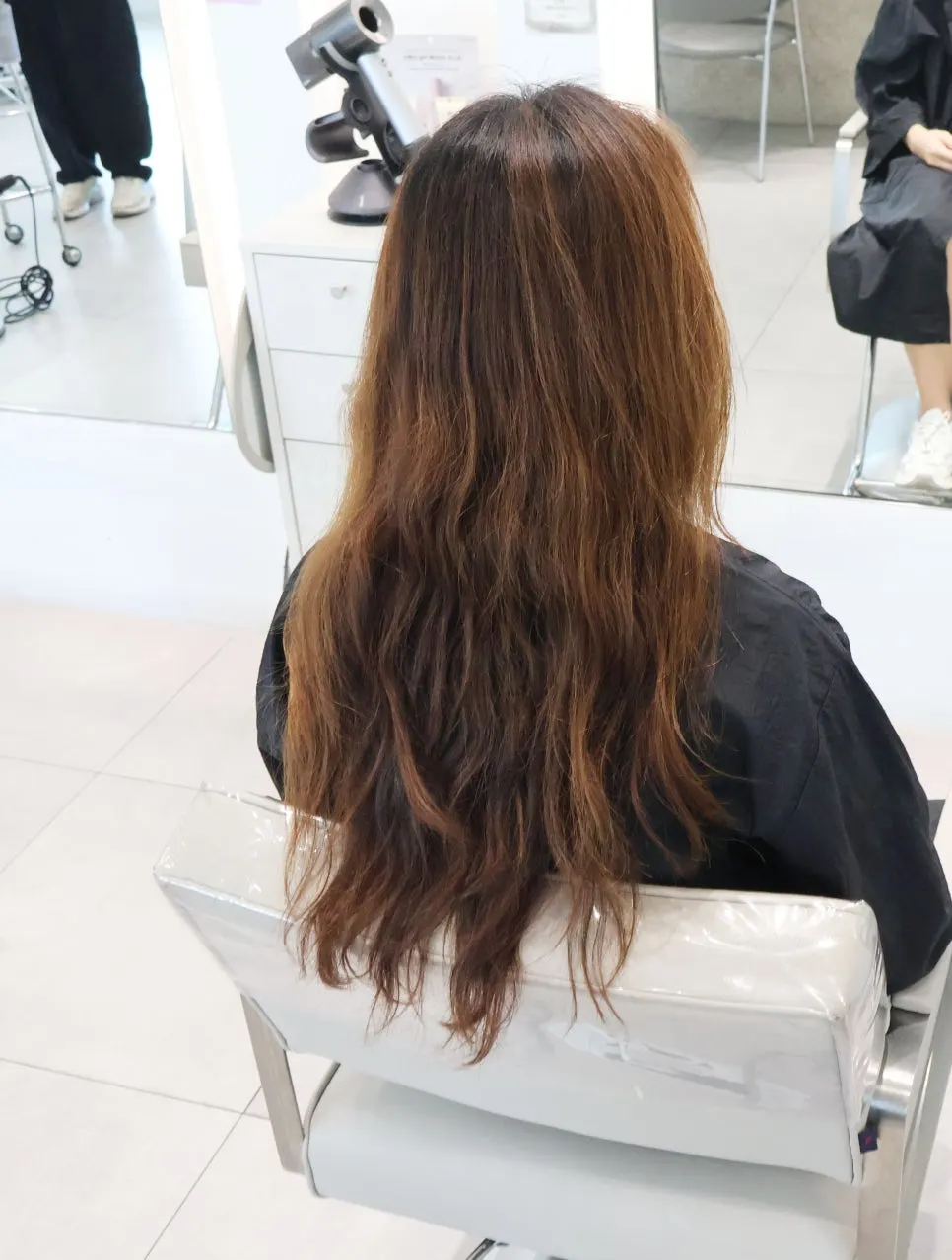 Before shot showing damage on long hair prior to treatment