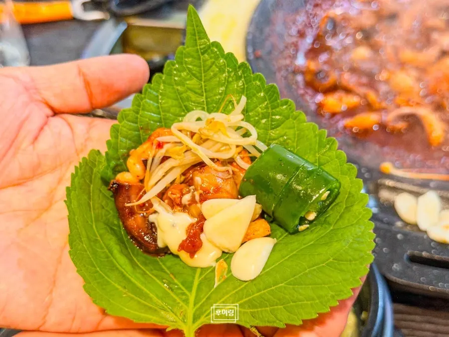 Octopus and pork belly wrapped in perilla leaf