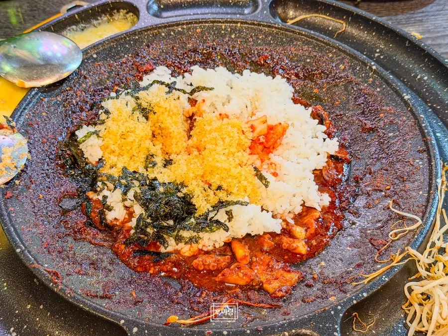 Flying fish roe fried rice cooking on the grill