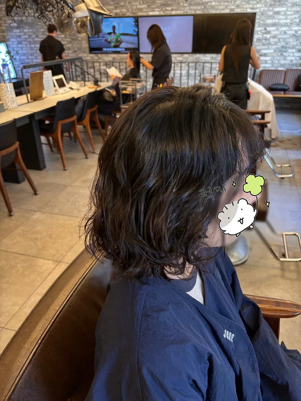 Finished lob perm with thick, natural waves