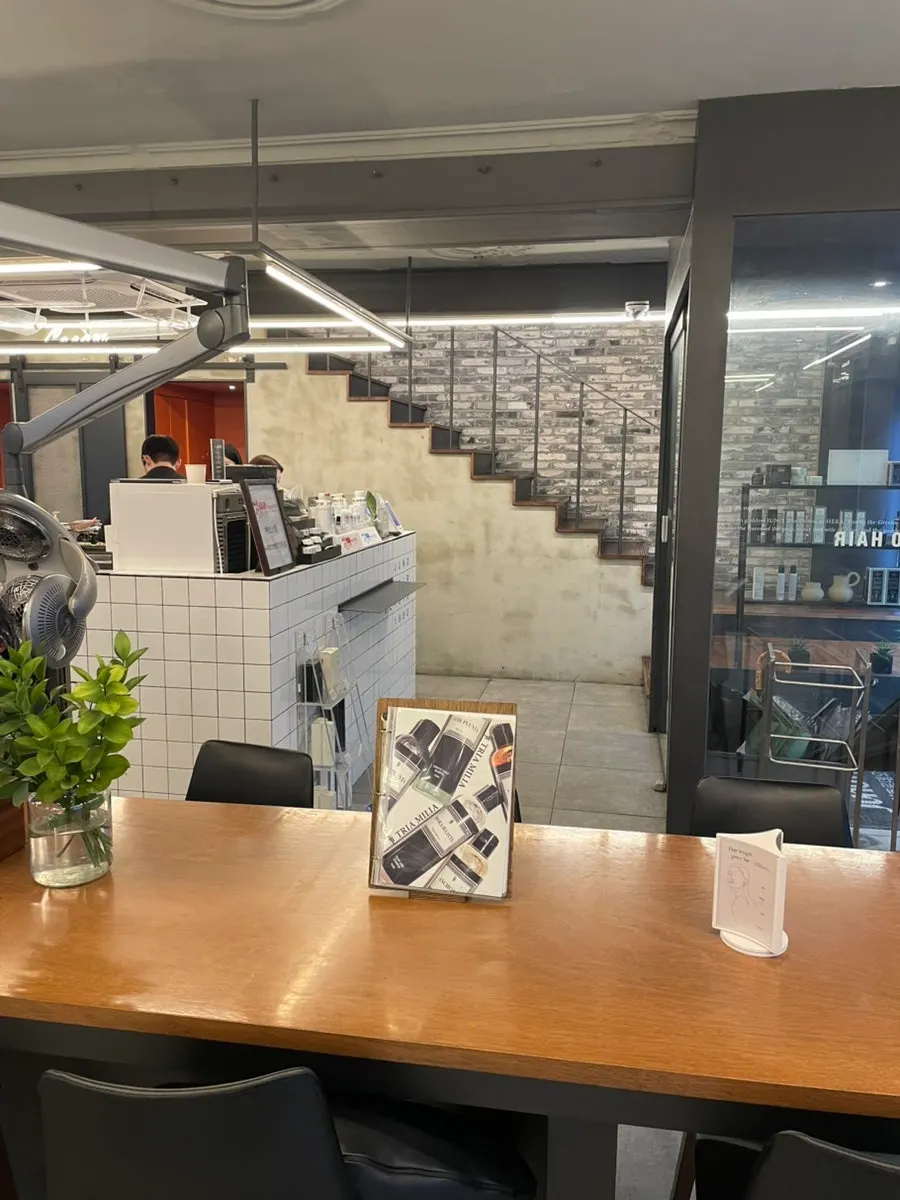 Treatment space spread across floors at Juno Hair Cheonho Rodeo Branch