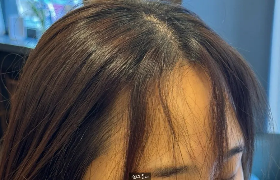 Fringe before treatment, needing hair-direction correction