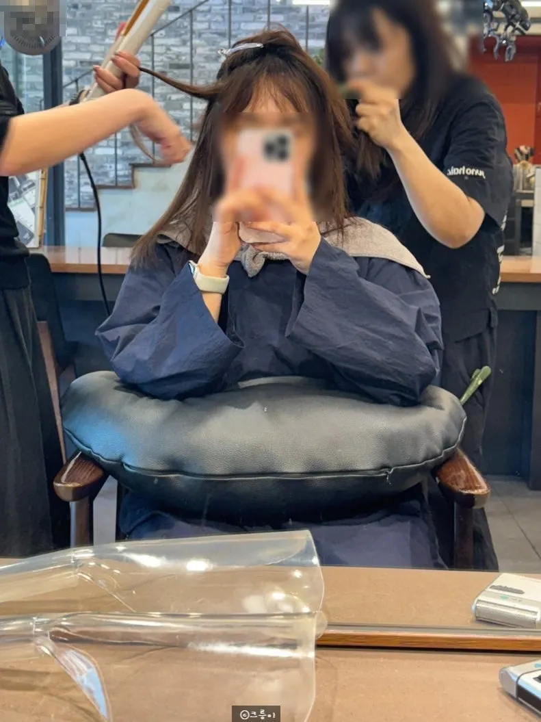 Flat-ironing the full straightening treatment