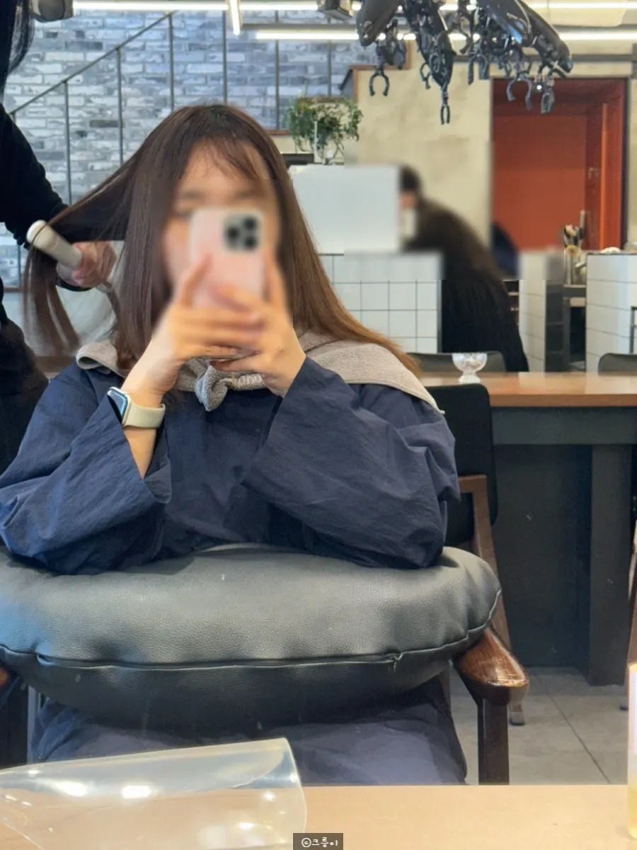 Neatly aligned hair after the flat-ironing step