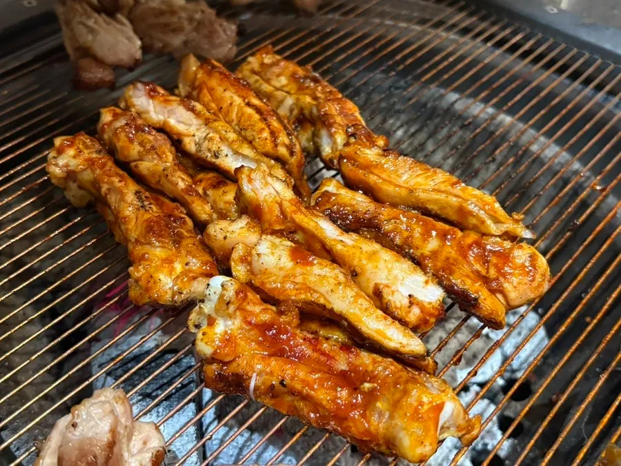 Spicy sauce chicken galbi grilling on the grill
