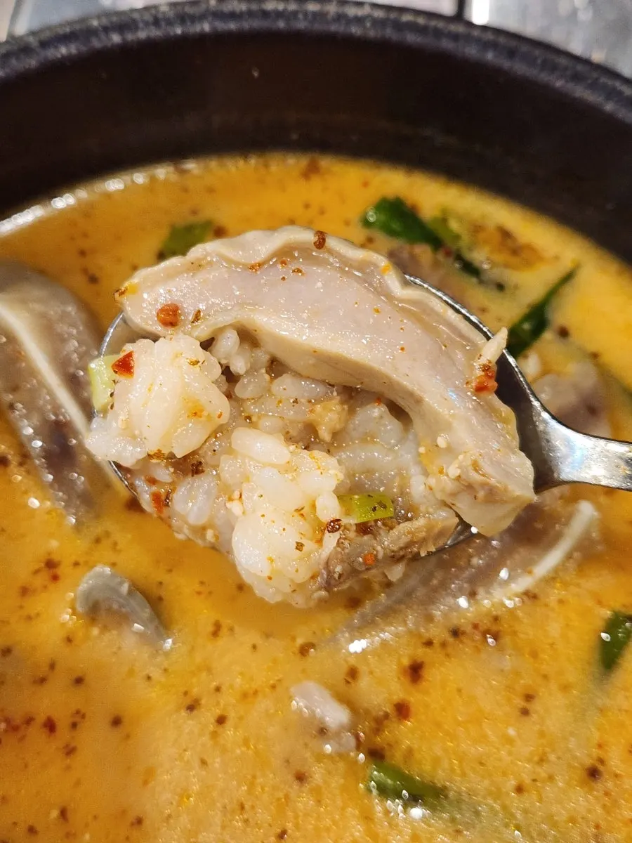 Oso-ri gukbap bowl filled with oso-ri gamtu (pig head offal)