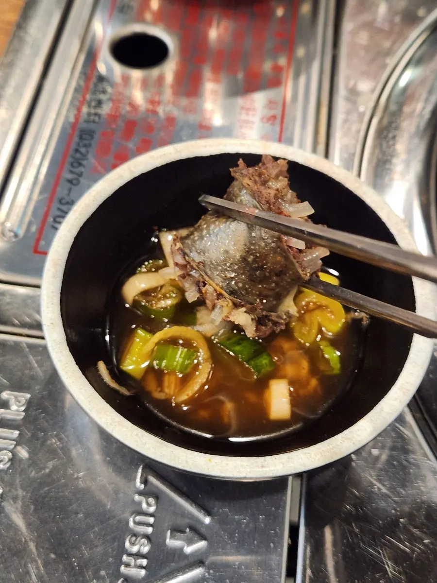 Traditional and vegetable sundae inside the sundae guk
