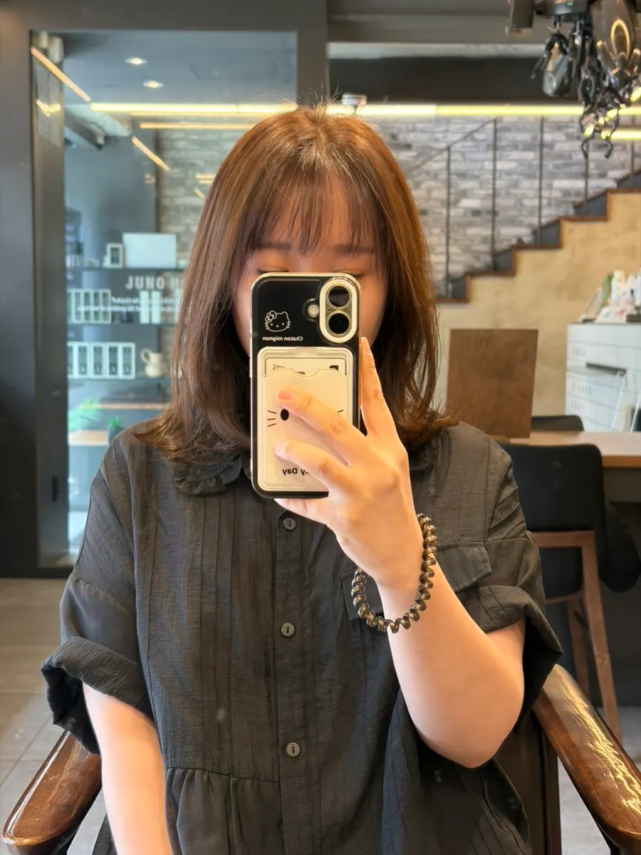 Autumn muted tone ash brown women's hair