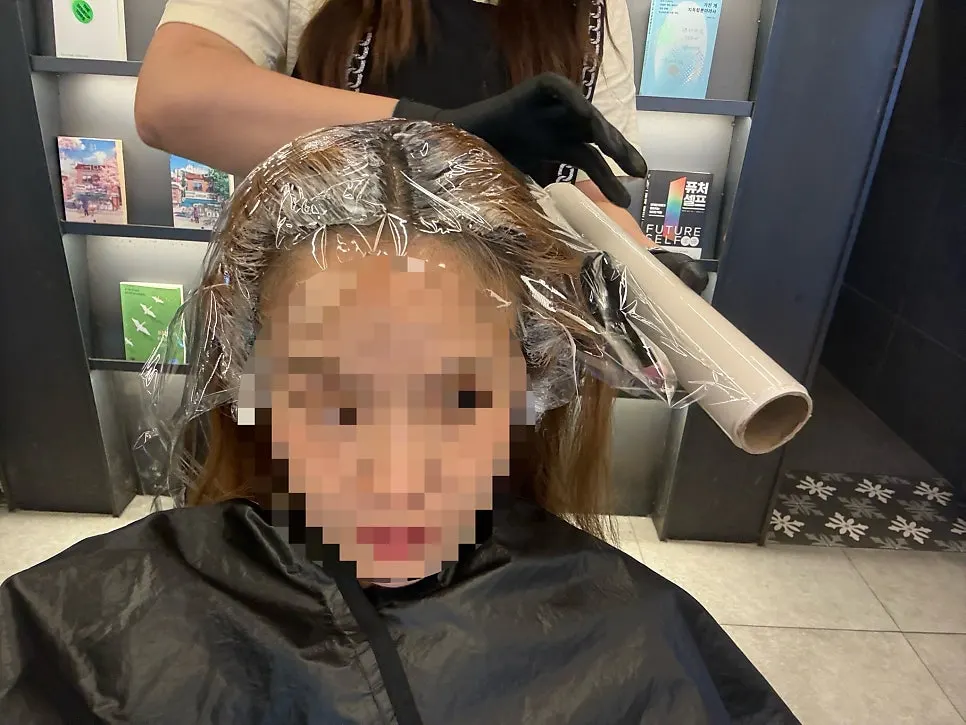 Checking the hair color before the root touch-up