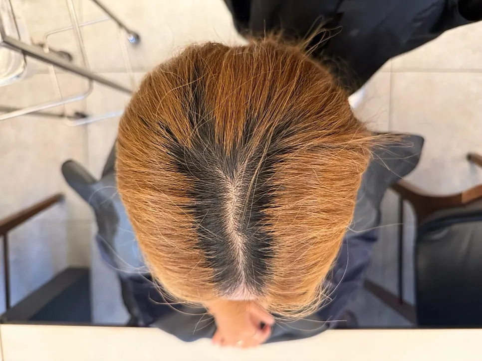 Selfie after finishing the root touch-up