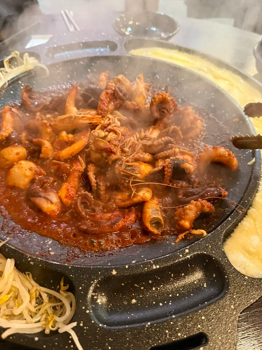 Soju served with jjukkumi and shrimp