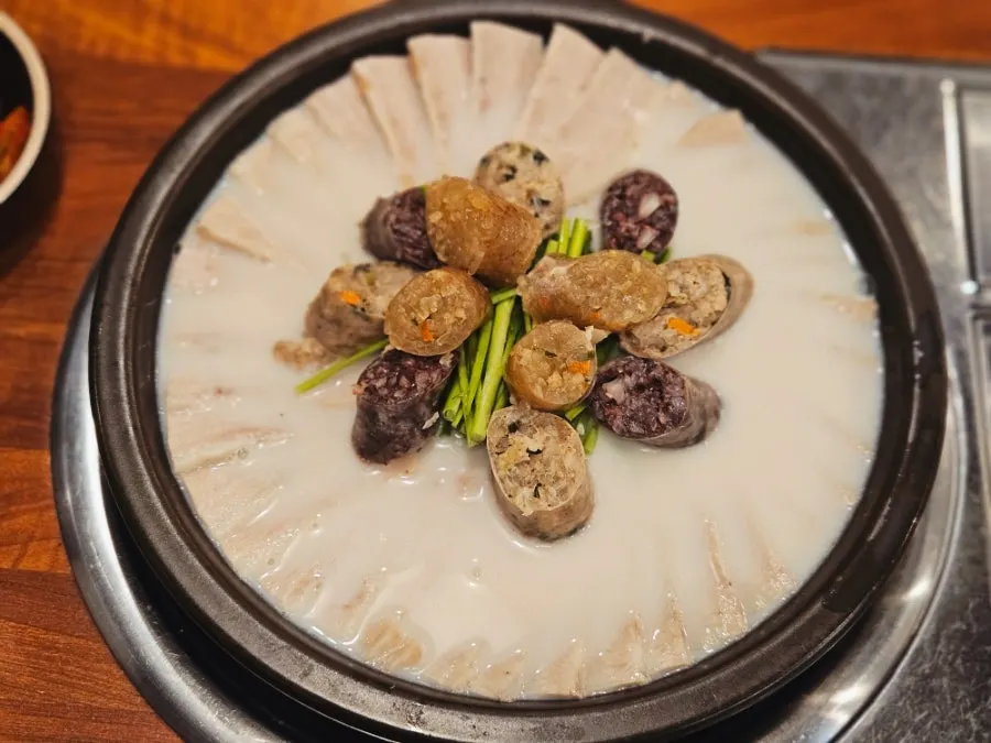 A bowl generously filled with hangjeong-sal and sundae