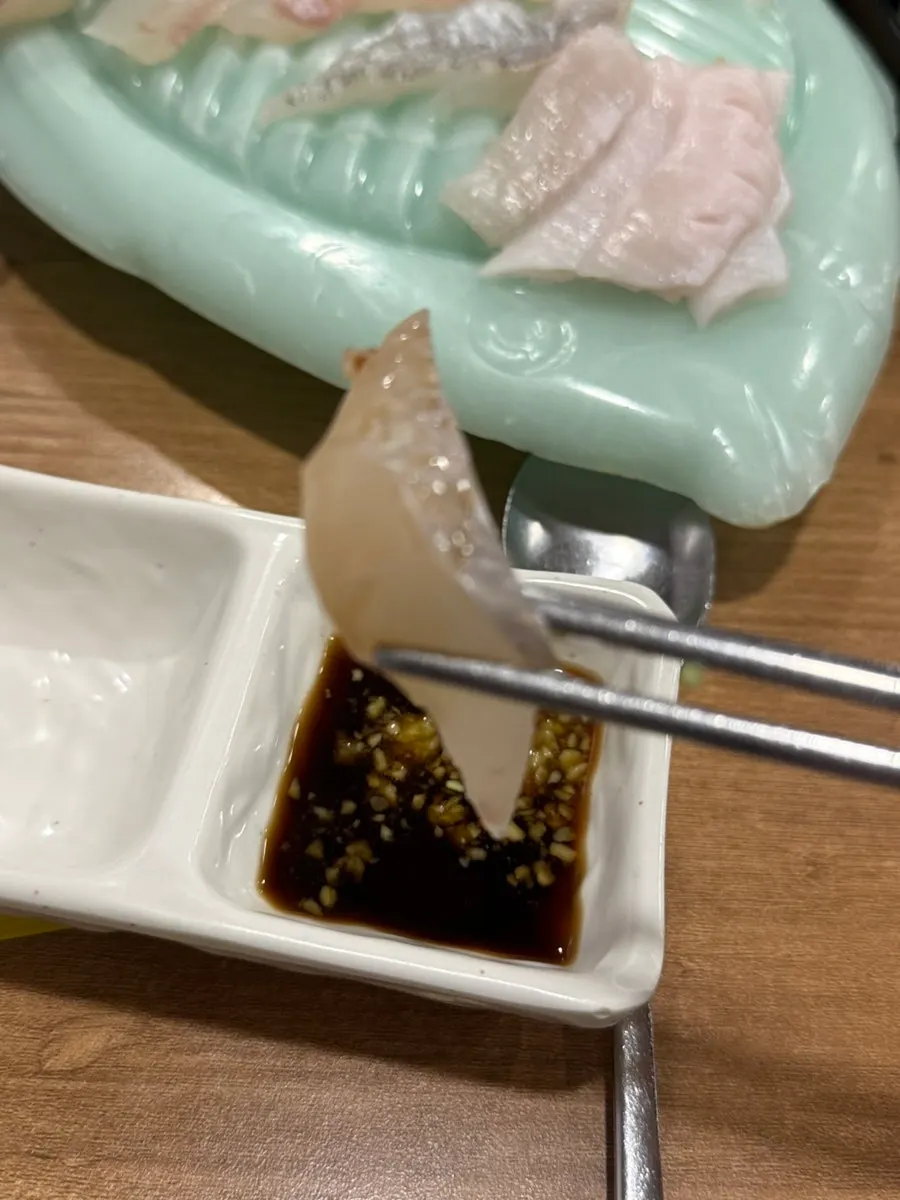 Close-up of chewy halibut sashimi texture