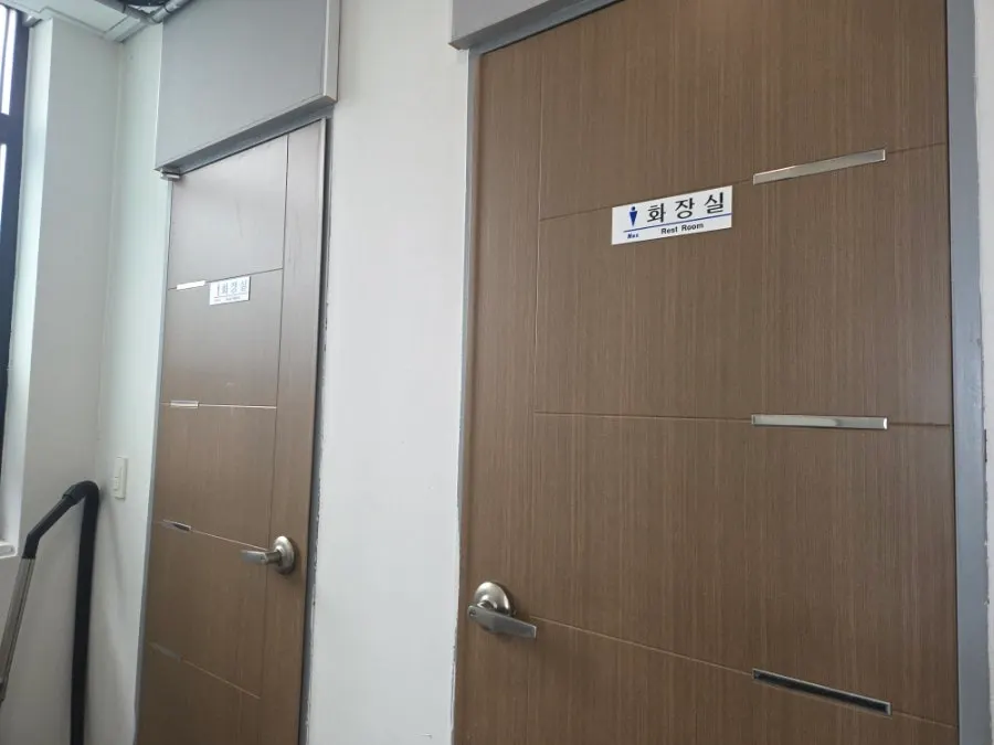 Interior of Cheonje Guksu and restroom signage