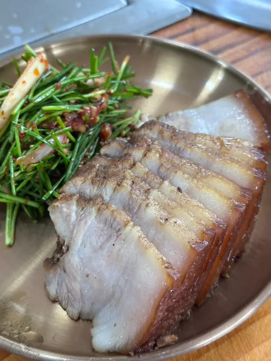 One serving of suyuk with chive salad