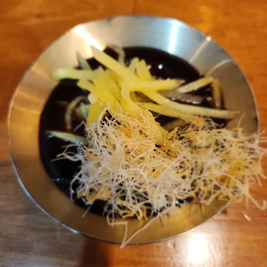 Eel sushi topped with a big piece of eel