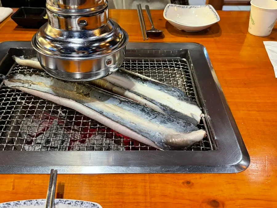 Close-up of prepped freshwater eel before grilling