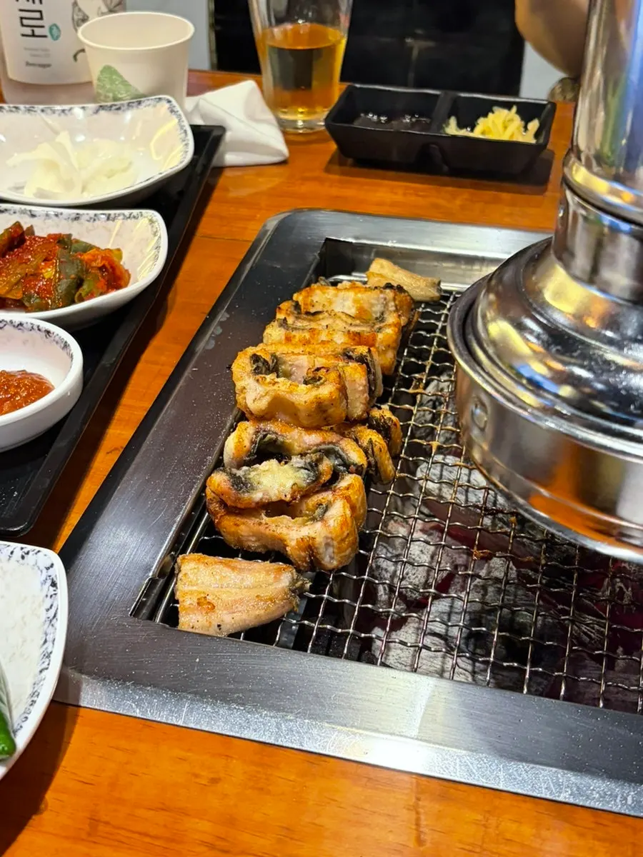 Warm grilled eel set aside off the fire