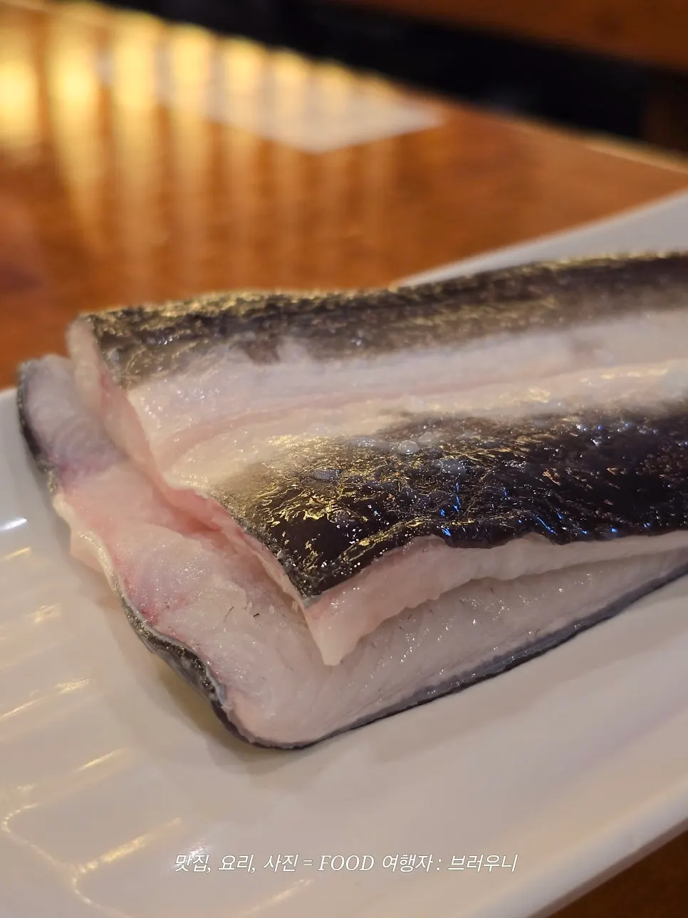 Grilled eel on a charcoal grill plate