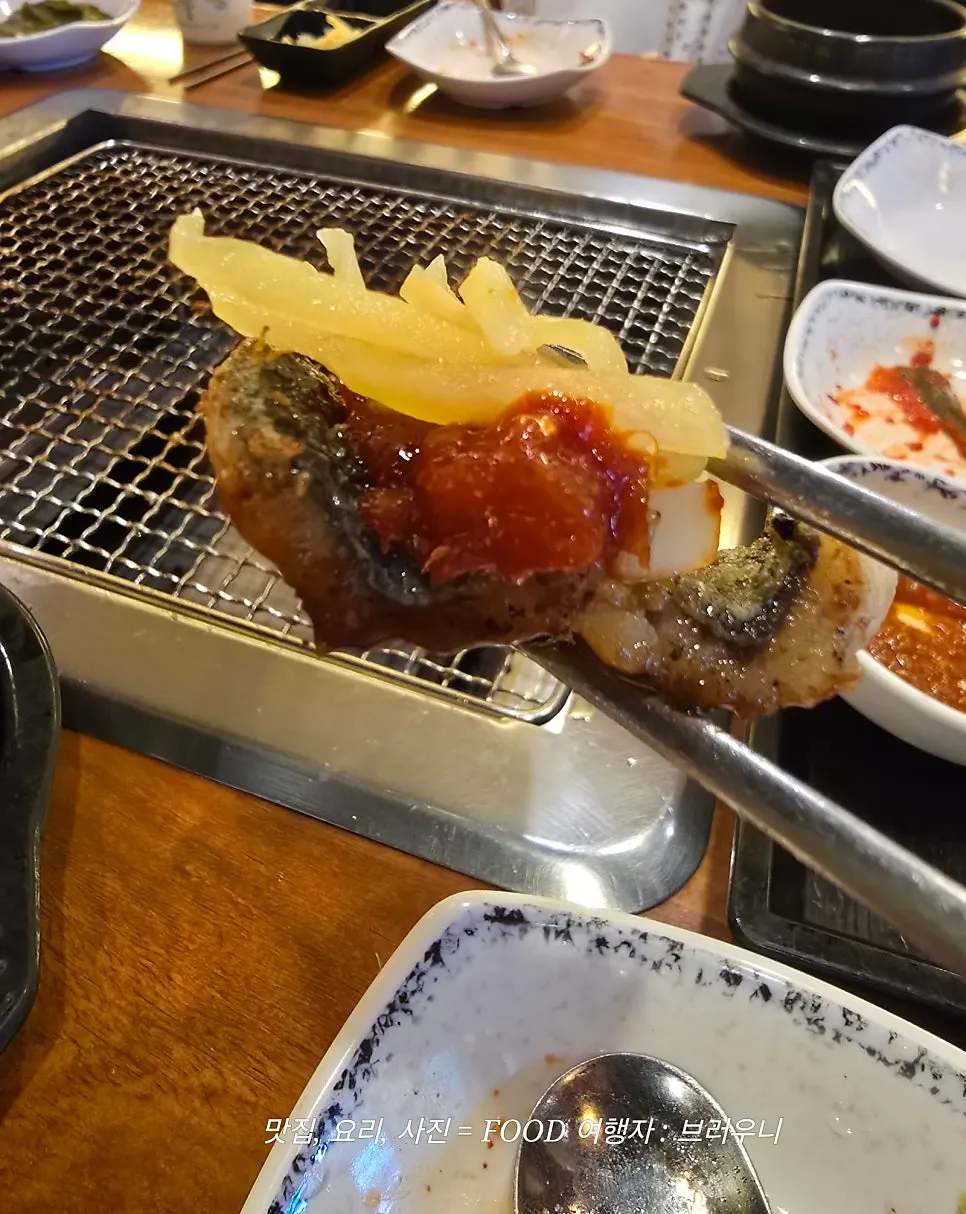 Deodeok-muchim served alongside the eel