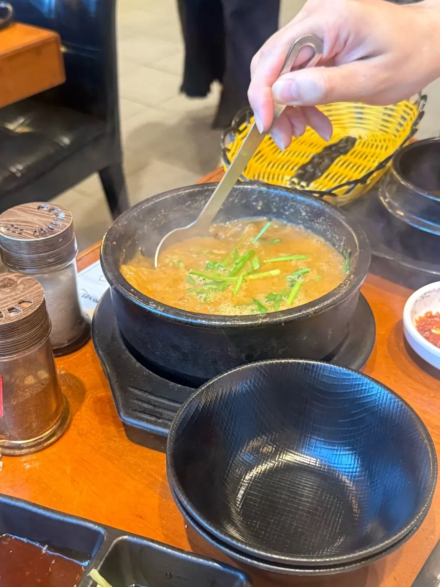 Warm eel soup that was ordered as an extra