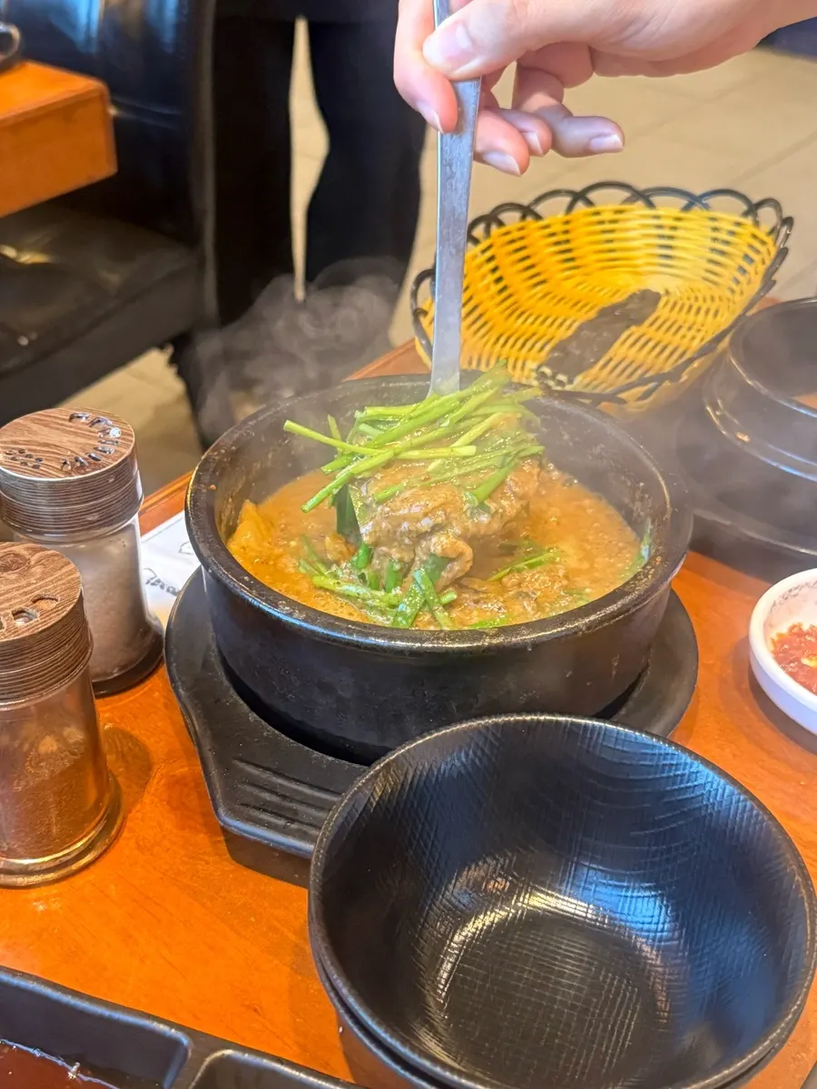A full meal spread including eel soup