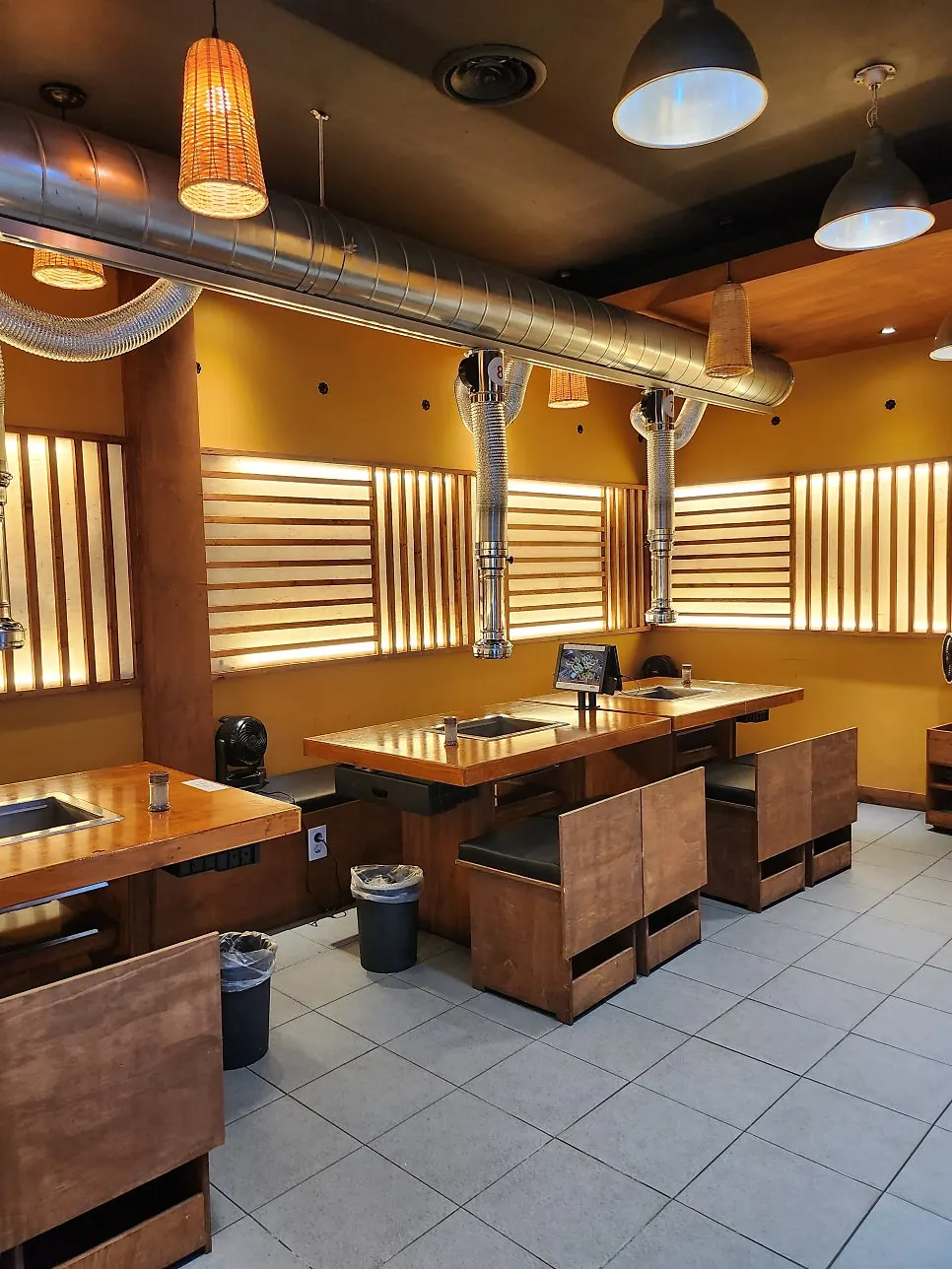 Widely spaced tables inside the restaurant