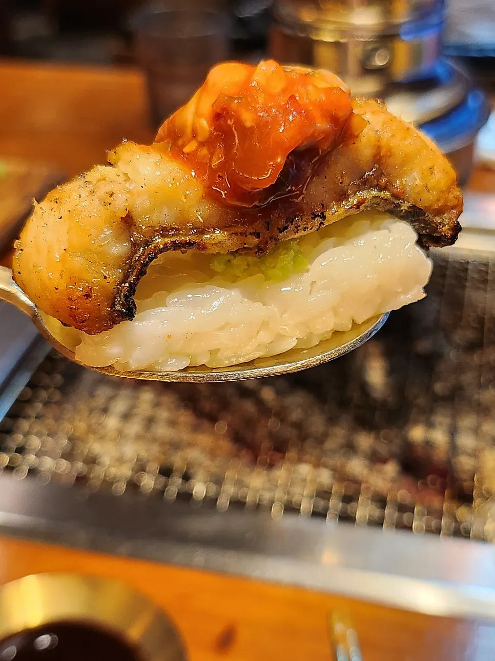 Eel sushi made with rice, eel, and oyster jeotgal