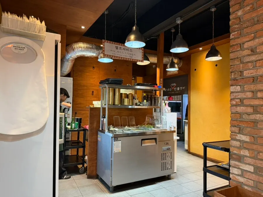 Self-serve bar with lettuce wraps and side dishes