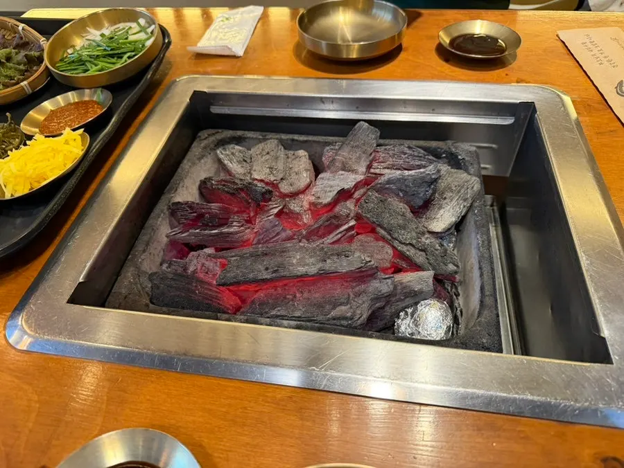 Charcoal fire lit and ready