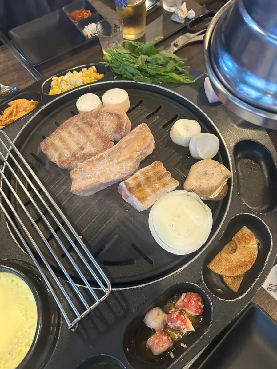 Kimchi and cheese grilling beside the meat