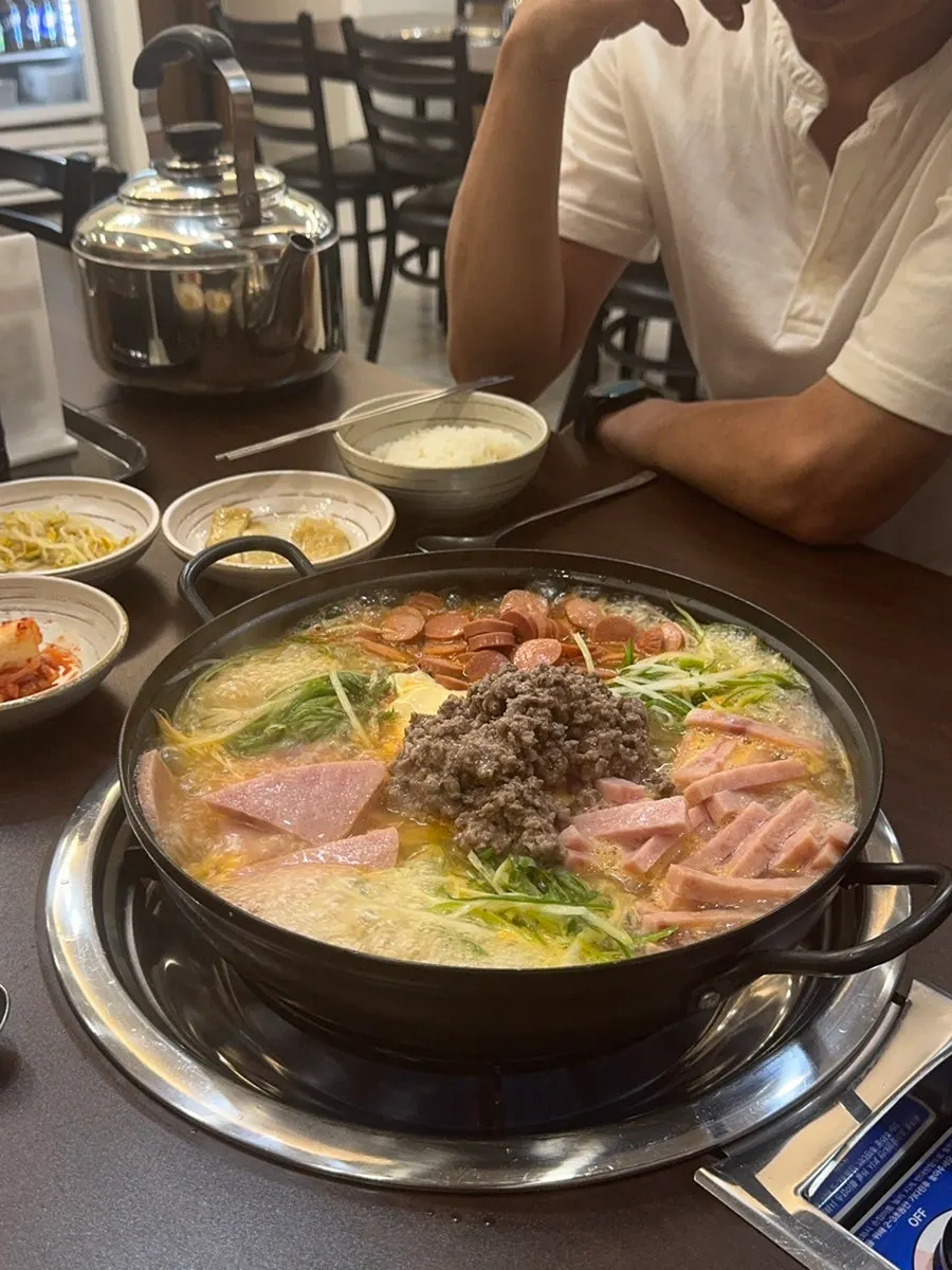 Songtan budae-jjigae hot pot boiling on the stove