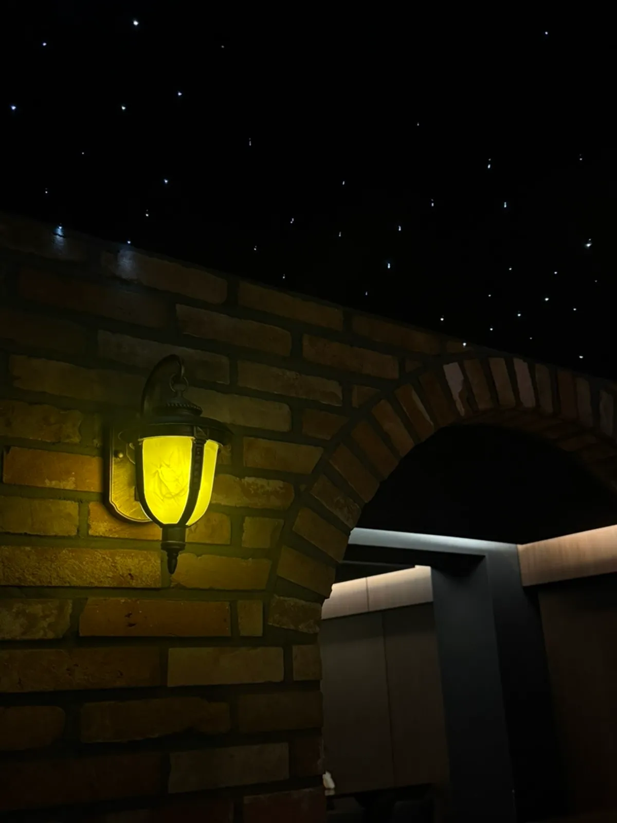The bonfire object at the center of Cherish Mansion under the starlit ceiling