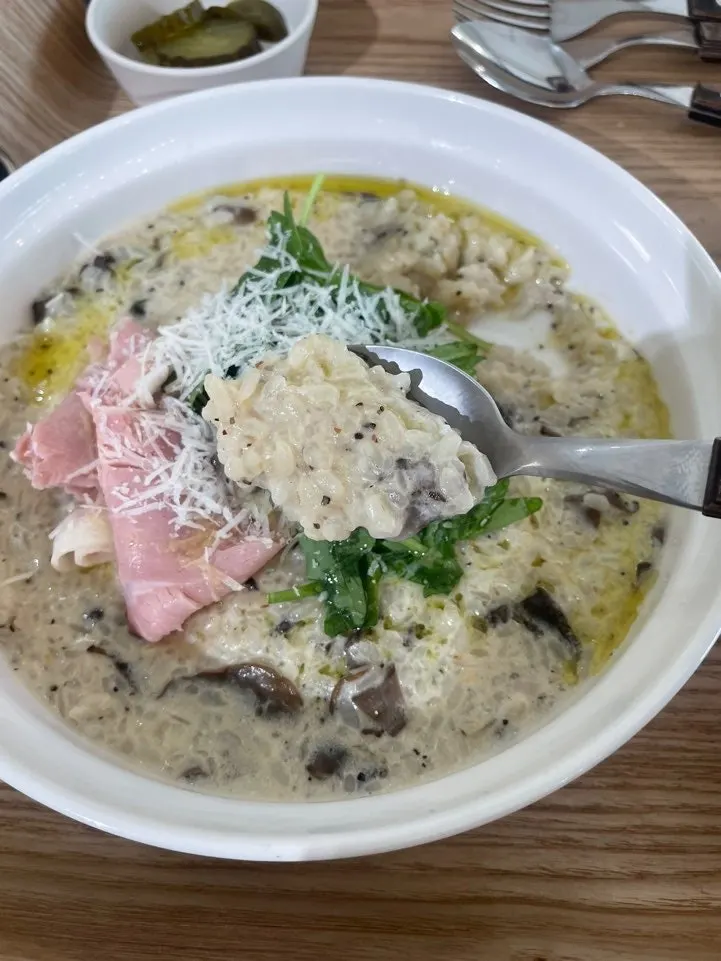 Close-up of al dente risotto rice in thick cream sauce