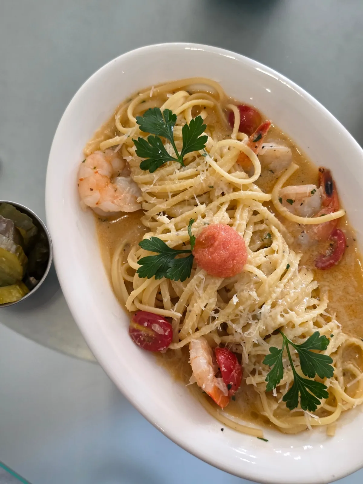 Mentaiko oil pasta topped with mentaiko and shrimp