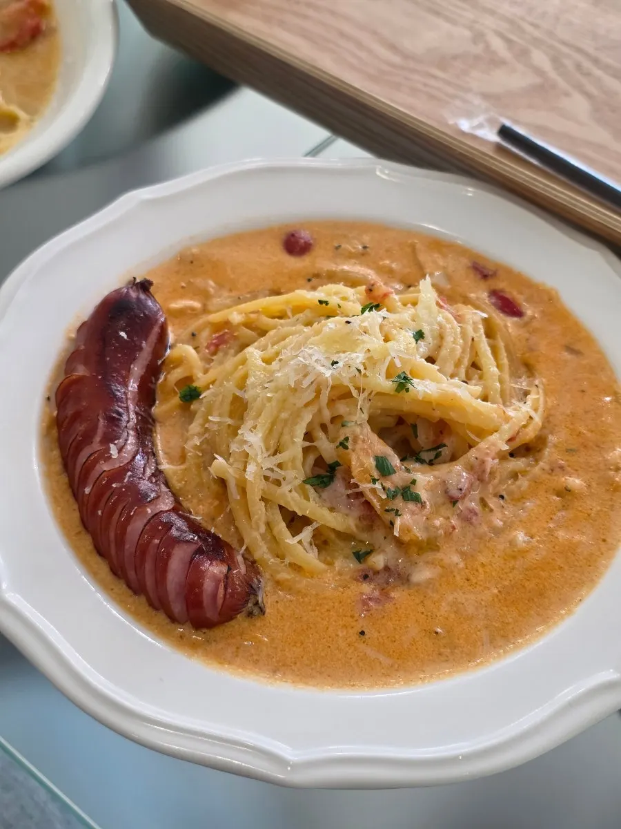 Plate of pasta with a slightly creamy oil sauce