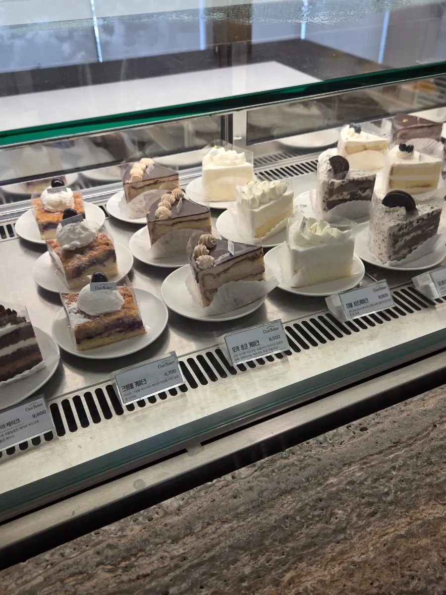 Sliced bread and cake showcase at Chat Baker