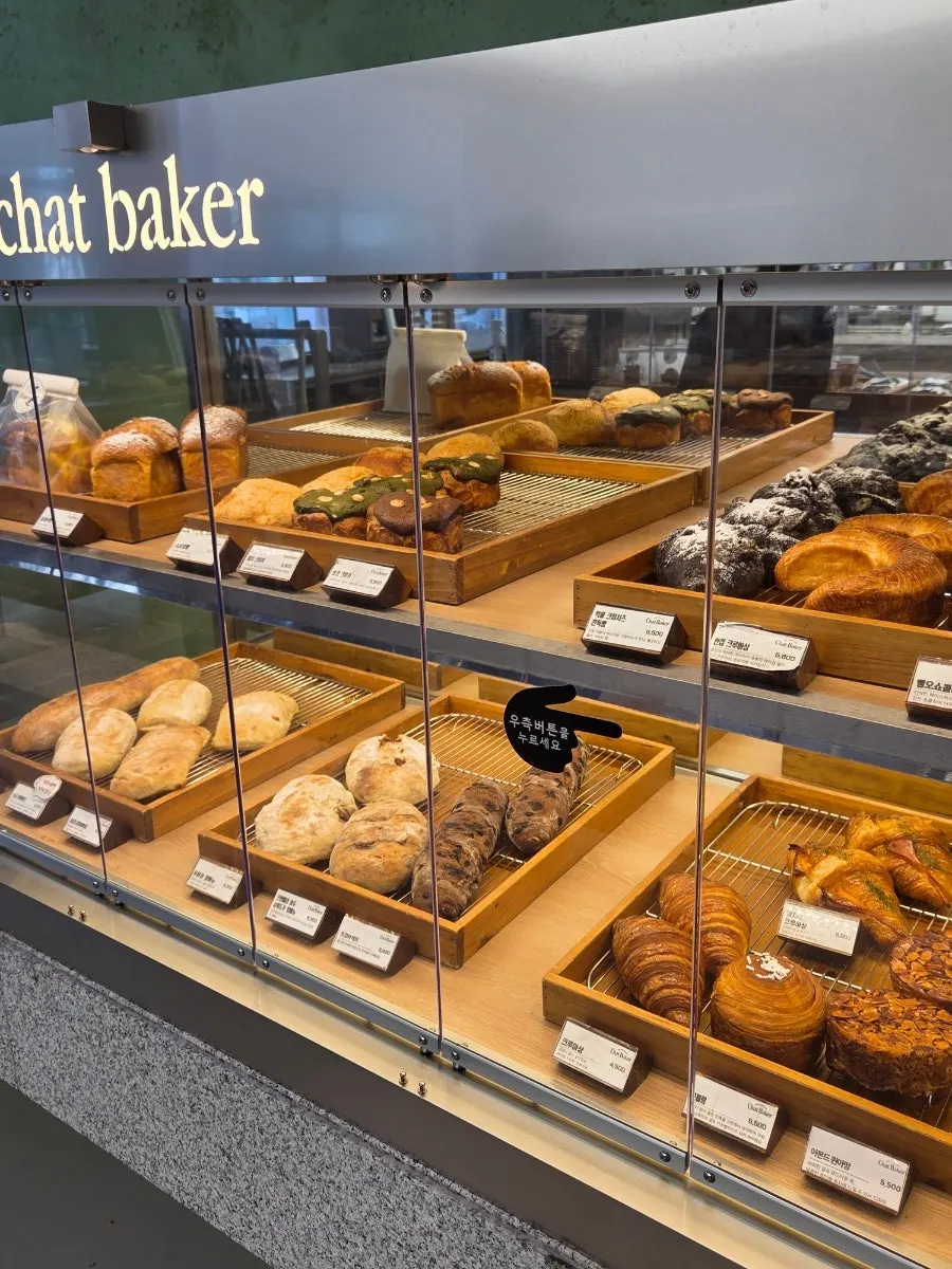 Close-up view of the bread display at Chat Baker