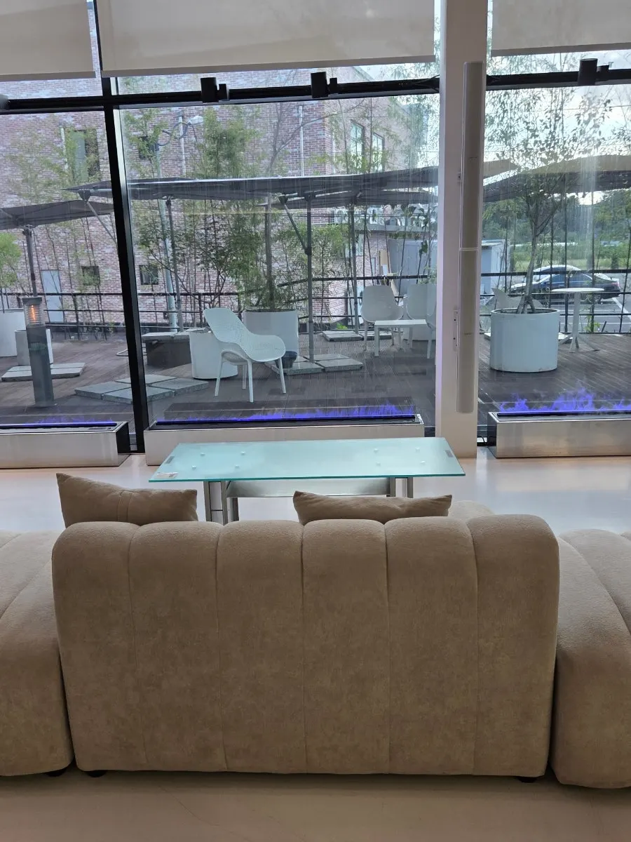 White and wood-toned interior of Chat Baker's 1st floor