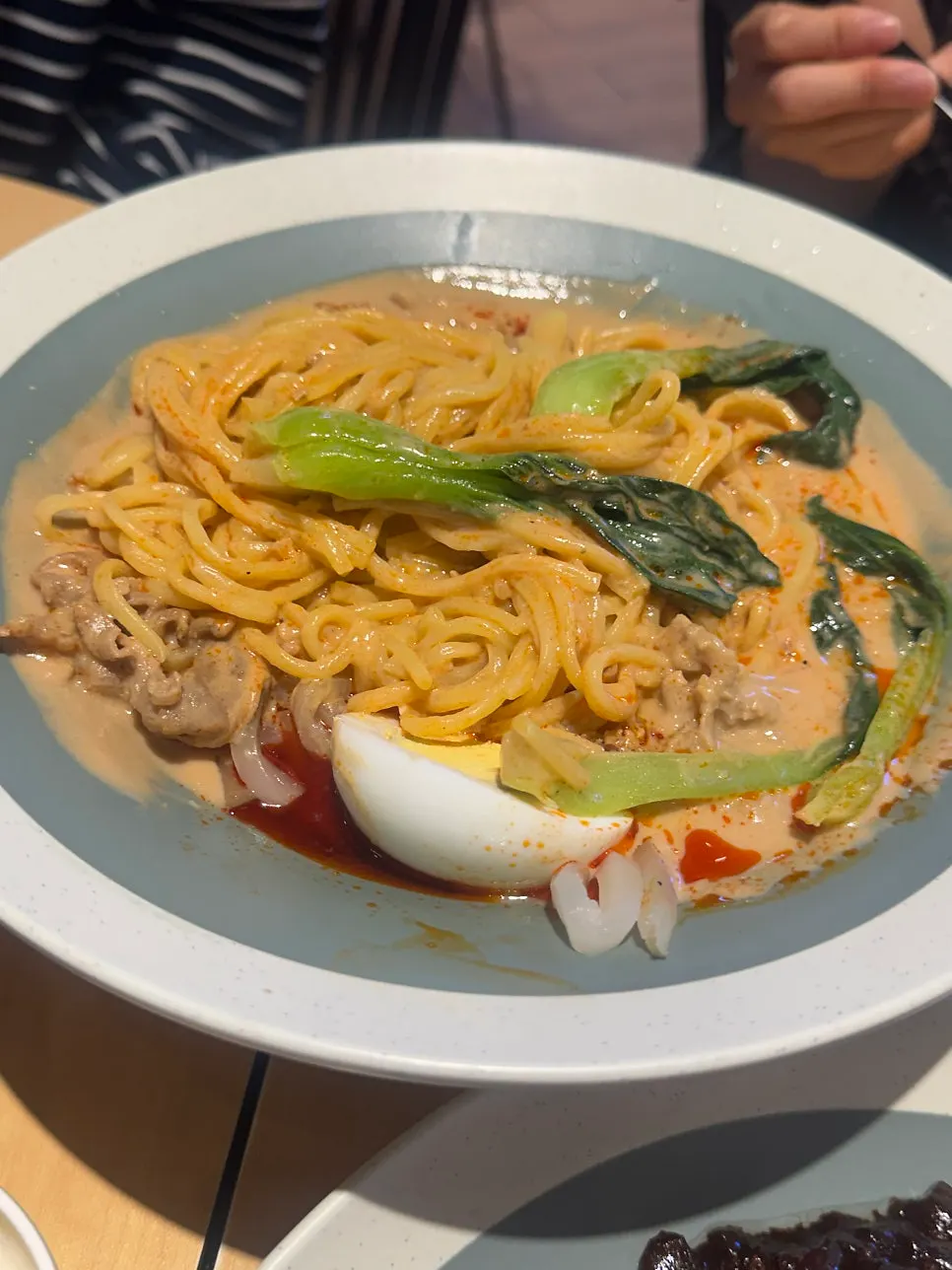 Beef topping piled onto the tantanmen noodles