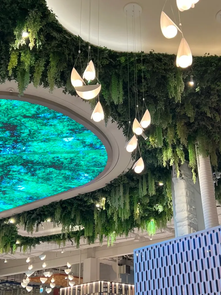 Inside Chibao Starfield Anseong Branch with an open kitchen view