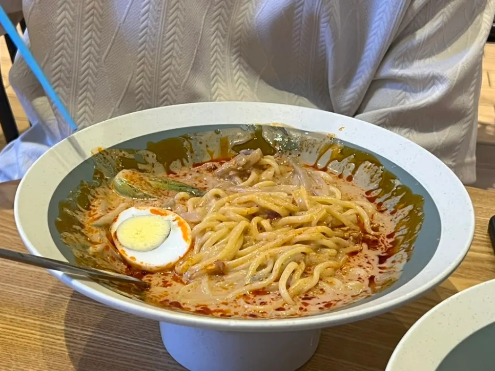 Noodles lifted up from the tantanmen bowl