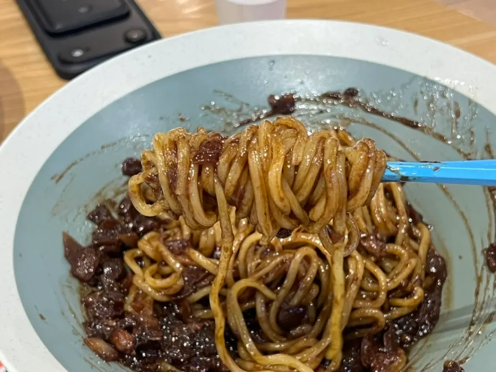 Jjajangmyeon and tantanmen portioned onto a small plate